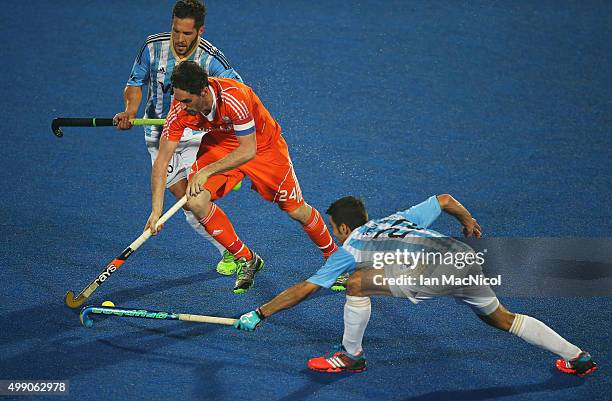 Robert van der Horst captain of Netherlands runs with the ball during the match between Argentina and Netherlands on day two of The Hero Hockey...