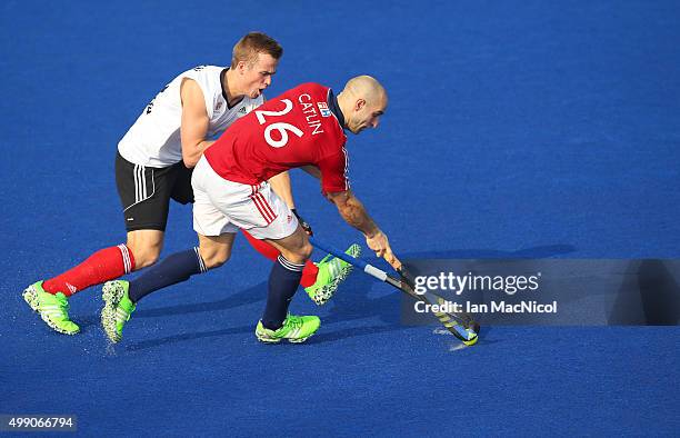 Gordon Johnston of Canada vies with Nick Catlin of Great Britain during the match between Great Britain and Canada on day two of The Hero Hockey...