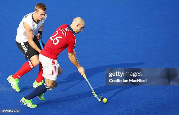Gordon Johnston of Canada vies with Nick Catlin of Great Britain during the match between Great Britain and Canada on day two of The Hero Hockey...