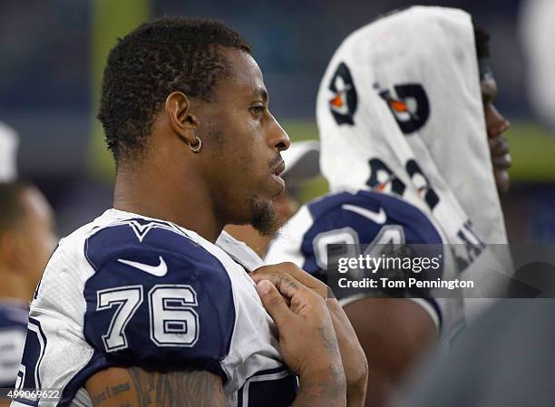 Greg Hardy of the Dallas Cowboys stands on the sidelines as the Cowboys take on the Carolina Panthers at AT&T Stadium on November 26, 2015 in...