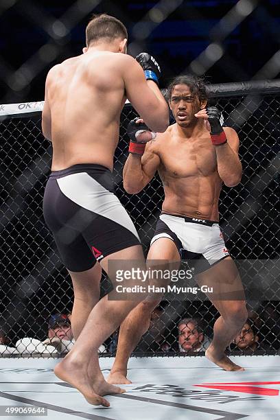 Benson Henderson of the United States of America stares down Jorge Masvidal of the United States of America in their welterweight bout during the UFC...