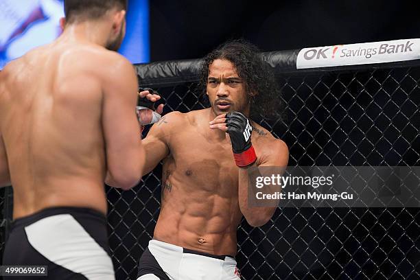 Benson Henderson of the United States of America stares down Jorge Masvidal of the United States of America in their welterweight bout during the UFC...