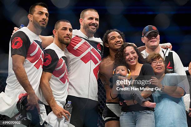 Benson Henderson of the United States of America celebrates with his family after his win over Jorge Masvidal of the United States of America in...