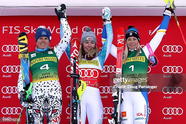 Mikaela Shiffrin of the United States celebrates on the podium after winning the slalom along with Veronika Velez Zuzulova of Slovakia in second...