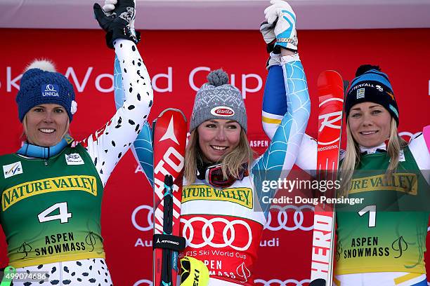 Mikaela Shiffrin of the United States celebrates on the podium after winning the slalom along with Veronika Velez Zuzulova of Slovakia in second...