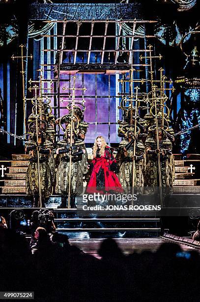 Singer Madonna performs during a concert in Antwerp on November 28, 2015. AFP PHOTO / BELGA / JONAS ROOSENS **Belgium Out** / AFP / BELGA / JONAS...