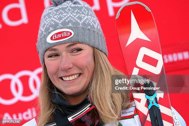 Mikaela Shiffrin of the United States celebrates on the podium after winning the slalom during the Audi FIS Women's Alpine Ski World Cup at the...