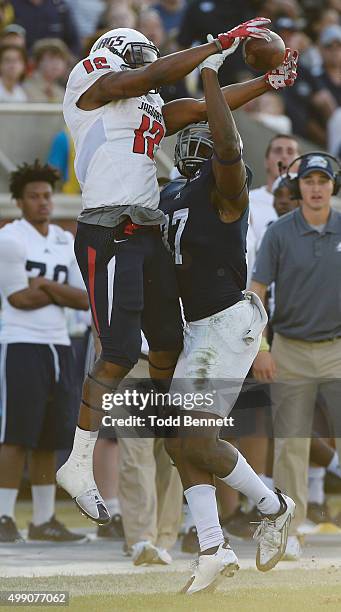 Linebacker Antwione Williams of the Georgia Southern Eagles breaks up a pass intended for tightend Gerald Everett of the South Alabama Jaguars during...