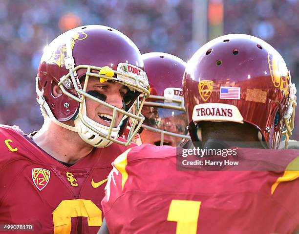 Cody Kessler of the USC Trojans celebrates the touchdown of Darreus Rogers to take a 33-21 lead over the UCLA Bruins during the third quarter at Los...