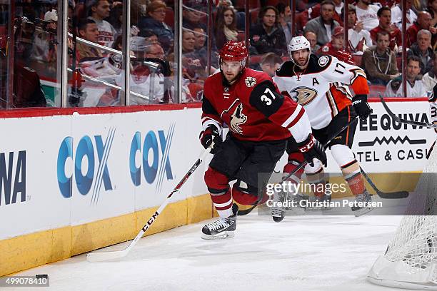 Dustin Jeffrey of the Arizona Coyotes skates after the puck during the NHL game against the Anaheim Ducks at Gila River Arena on November 25, 2015 in...