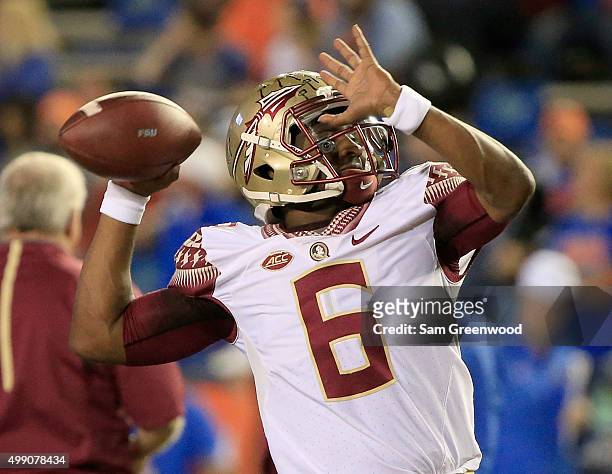 Everett Golson of the Florida State Seminoles warms up before the game against the Florida Gators at Ben Hill Griffin Stadium on November 28, 2015 in...