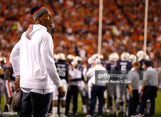 Cam Newton, quarterback of the Carolina Panthers, looks on during the game between the Auburn Tigers and Alabama Crimson Tide at Jordan Hare Stadium...