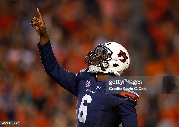 Jeremy Johnson of the Auburn Tigers reacts after a touchdown pass against the Alabama Crimson Tide at Jordan Hare Stadium on November 28, 2015 in...