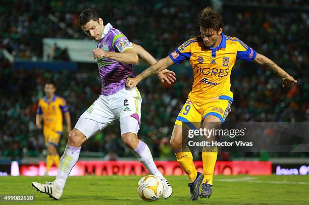 Rafael Sobis of Tigres struggles for the ball with Javier Munoz of Chiapas during the quarterfinals second leg match between Chiapas and Tigres UANL...