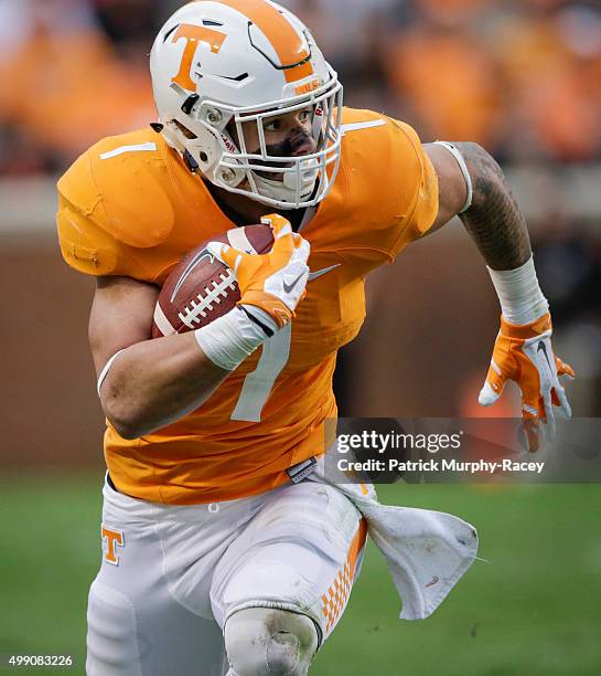 Jalen Hurd of the Tennessee Volunteers drives upfield against the Vanderbilt Commodores in a game at Neyland Stadium on November 28, 2015 in...