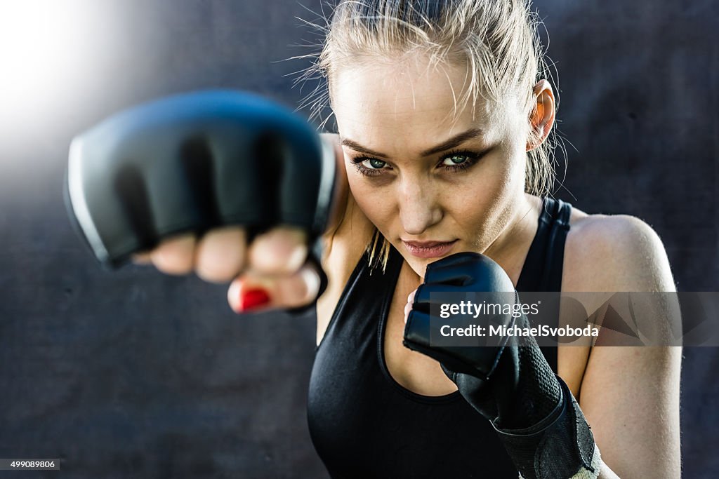 Women Fighter Punching Close Up