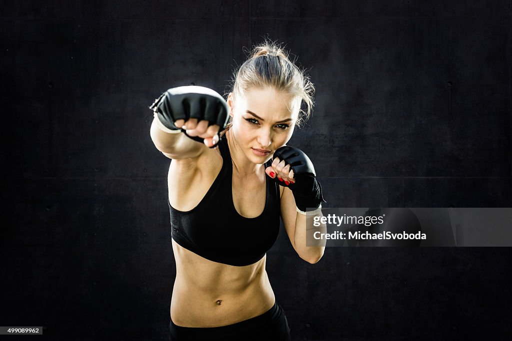 Women Fighter Punching Close Up