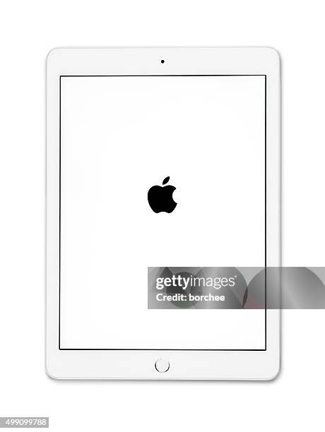 apple ipad air 2 silver - ipad vertical stock pictures, royalty-free photos & images