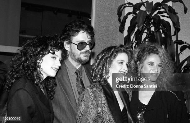 American songwriters Gerry Goffin and Carole King pose with their daughters Louise Goffin and Sherry Goffin Kondor, backstage at a Songwriters'...