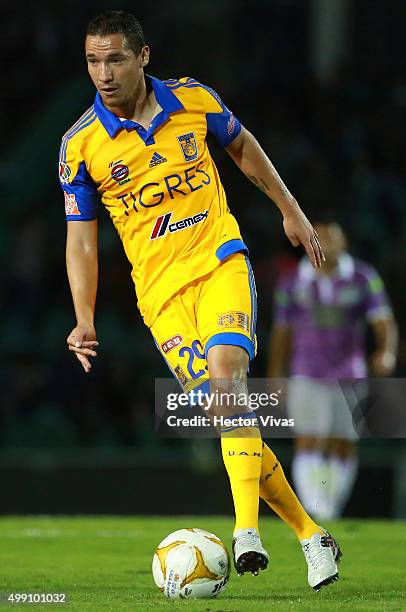 Alberto Duenas of Tigres drives the ball during the quarterfinals second leg match between Chiapas and Tigres UANL as part of the Apertura 2015 Liga...