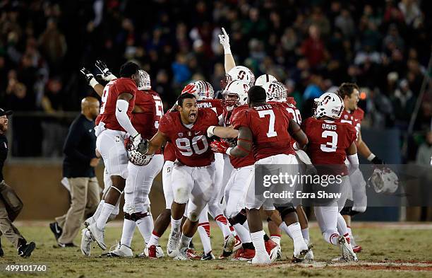 Players on the Stanford Cardinal, including Solomon Thomas, celebrate after Conrad Ukropina of the Stanford Cardinal kicked a game-winning field at...