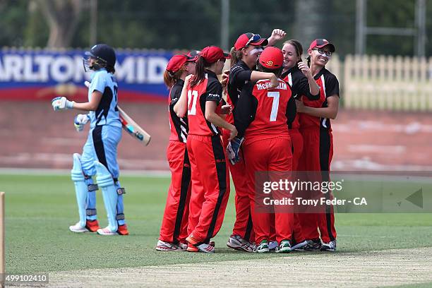 Scorpions celebrate the wicket of Laura Marsh of NSW Breakers during the WNCL Final match between the New South Wales and South Australia at...