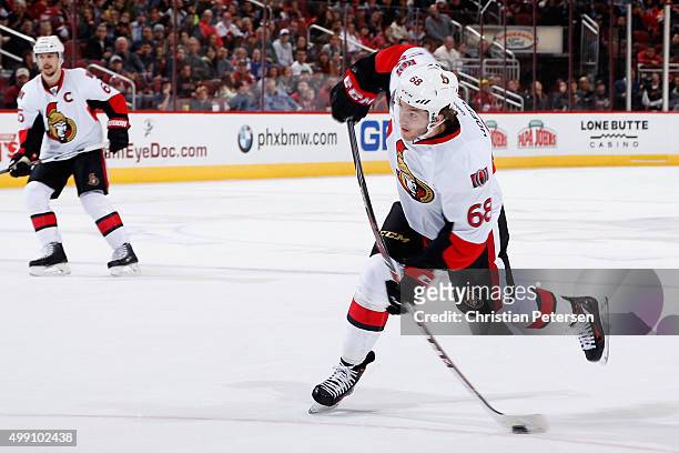 Mike Hoffman of the Ottawa Senators shoots to score a second period goal against the Arizona Coyotes during the NHL game at Gila River Arena on...