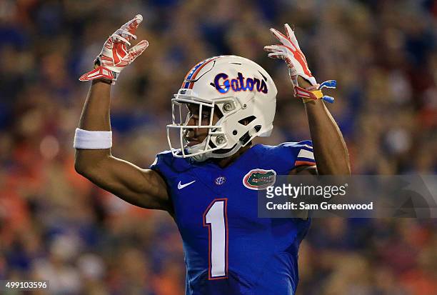 Vernon Hargreaves III of the Florida Gators asks the crowd for noise during the game against the Florida State Seminoles at Ben Hill Griffin Stadium...