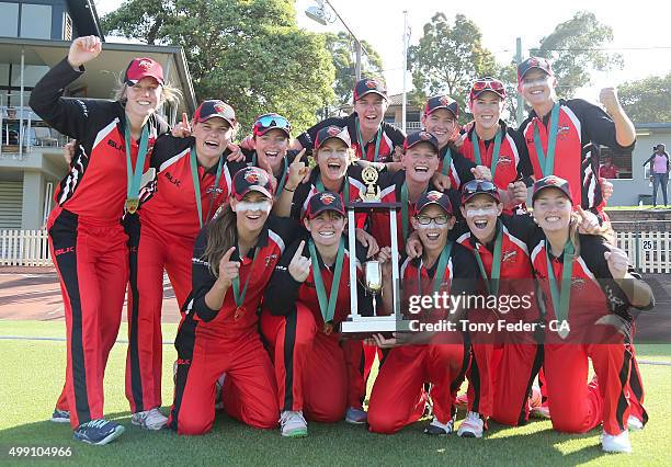 Scorpions celebrate with the winners trophy during the WNCL Final match between the New South Wales and South Australia at Hurstville Oval on...