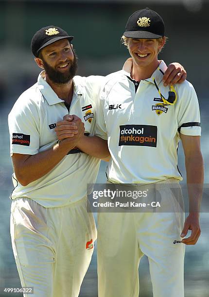 David Moody of Western Australia congratulates Andrew Tye at the conclusion of the first innings during day three of the Sheffield Shield match...