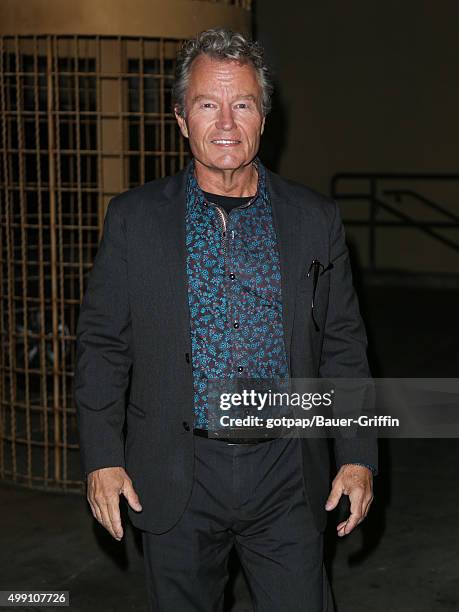 John Savage is seen arriving at the premiere of 'Black Dove' on November 28, 2015 in Los Angeles, California.