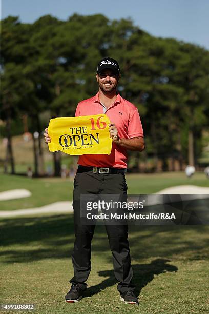 Nick Cullen of Australia poses for a photo with his flag after qualifying for the 2015 British Open during day four of the 2015 Australian Open at...