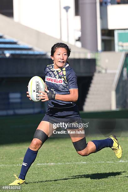 Aya Takeuchi of Japan runs with the ball during the World Sevens Asia Olympic Qualification match between Japan and Sri Lanka at Prince Chichibu...