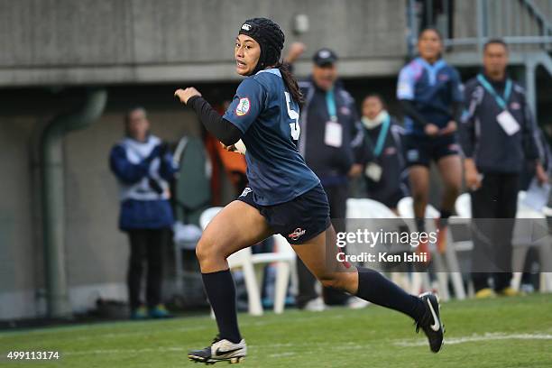 Thanuja Dilrukshi of Guam runs in to score during the World Sevens Asia Olympic Qualification match between Guam and Sri Lanka at Prince Chichibu...