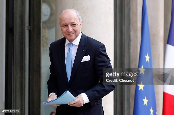 Laurent Fabius, French Minister of Foreign Affairs and International Development arrives to attend a meeting with French President Francois Hollande...