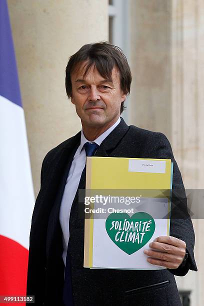 French environmental activist Nicolas Hulot arrives to attend a meeting with French President Francois Hollande at the Elysee Presidential Palace on...