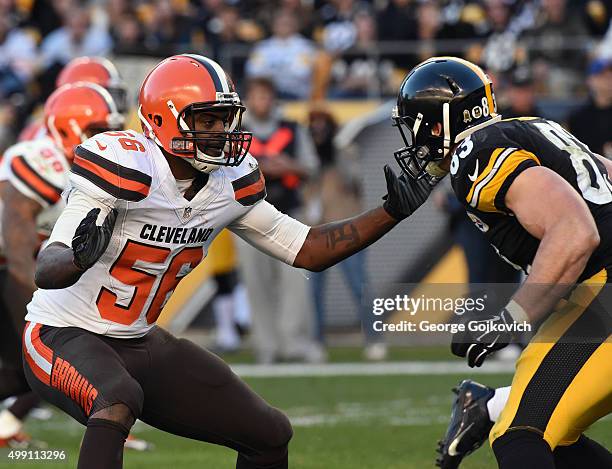 Linebacker Karlos Dansby of the Cleveland Browns pursues the play against tight end Heath Miller of the Pittsburgh Steelers during a game at Heinz...