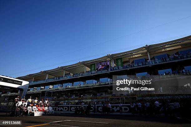 Daniel Ricciardo of Australia and Infiniti Red Bull Racing, Daniil Kvyat of Russia and Infiniti Red Bull Racing, Nico Rosberg of Germany and Mercedes...