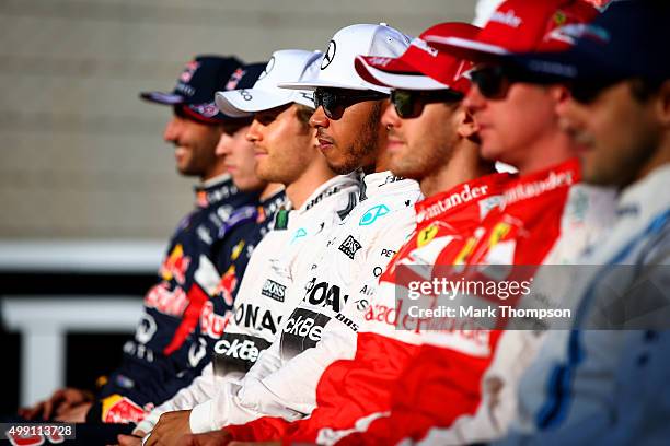 Daniel Ricciardo of Australia and Infiniti Red Bull Racing, Daniil Kvyat of Russia and Infiniti Red Bull Racing, Nico Rosberg of Germany and Mercedes...