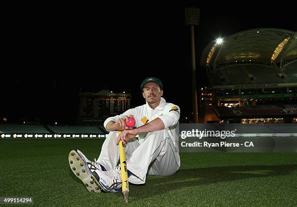 Peter Siddle of Australia poses on the ground after claiming his 200th Test wicket during day three of the Third Test match between Australia and New...