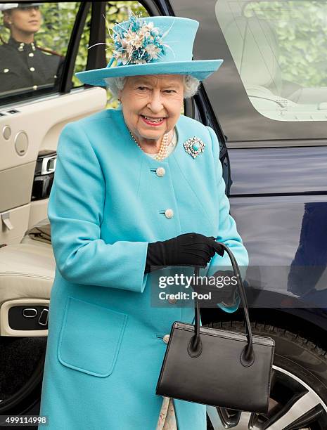 Queen Elizabeth II arrives to embark a boat for a trip across Valletta Harbour departing from Kalkara and arriving at Customs Wharf on November 28,...