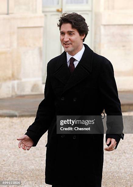 Canadian Prime minister, Justin Trudeau arrives to attend a meeting with French President Francois Hollande at the Elysee Presidential Palace on...