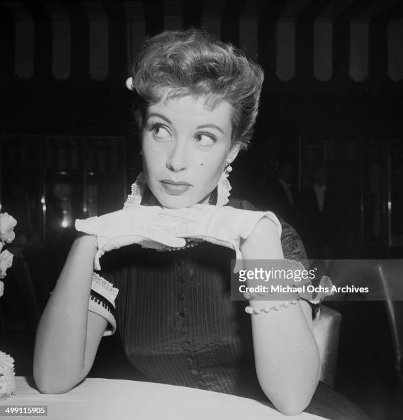 Actress Gloria DeHaven attends the Joan Crawford Fashion Show in Los Angeles, California.
