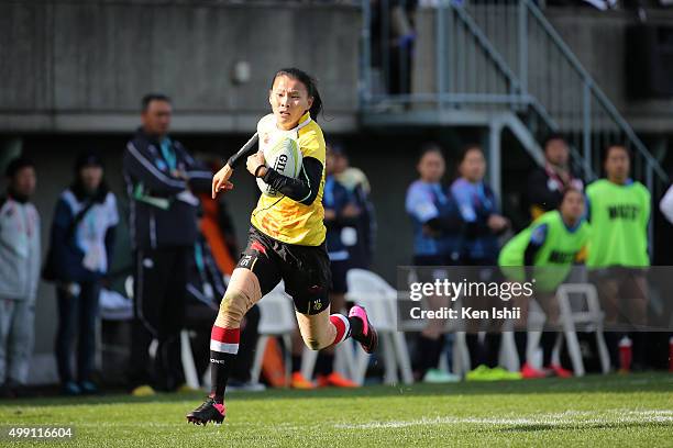 Sun Shichao of China runs in to score the World Sevens Asia Olympic Qualification match between China and Guam at Prince Chichibu Stadium on November...