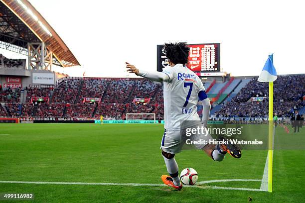 Yasuhito Endo of Gamba Osaka takes a corner kick during the J.League 2015 Championship semi final match between Urawa Red Diamonds and Gamba Osaka at...