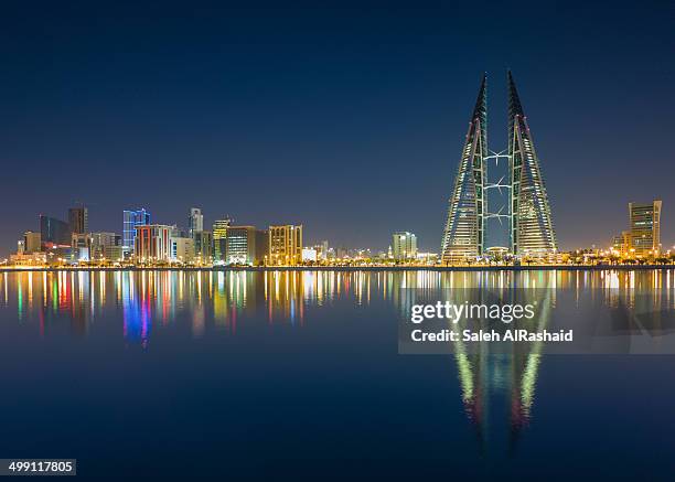 bahrain manama reflection - bahrain skyline stock pictures, royalty-free photos & images