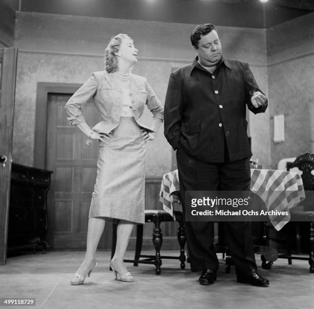 Actress Audrey Meadows and Jackie Gleason on stage during the rehearsal of the "The Jackie Gleason Show" in Los Angeles, California.