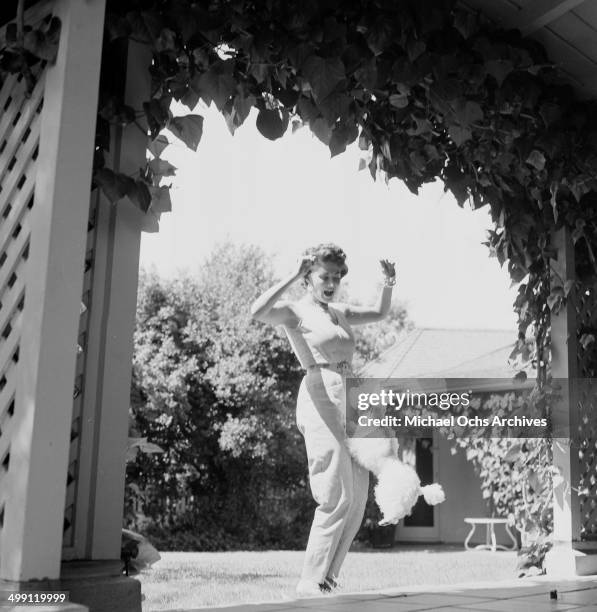 Actress Yvonne De Carlo poses at home in Los Angeles, California.