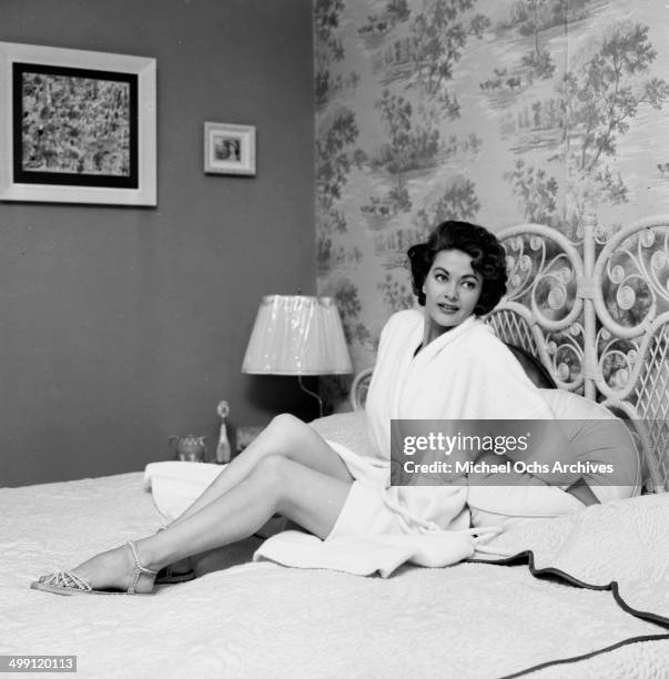 Actress Yvonne De Carlo poses at home in Los Angeles, California.