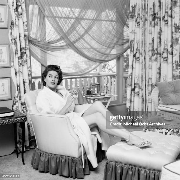 Actress Yvonne De Carlo poses at home in Los Angeles, California.